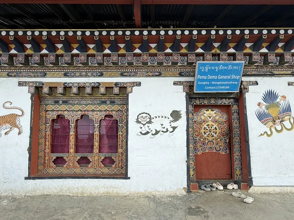 A painted tiger on a dzong wall