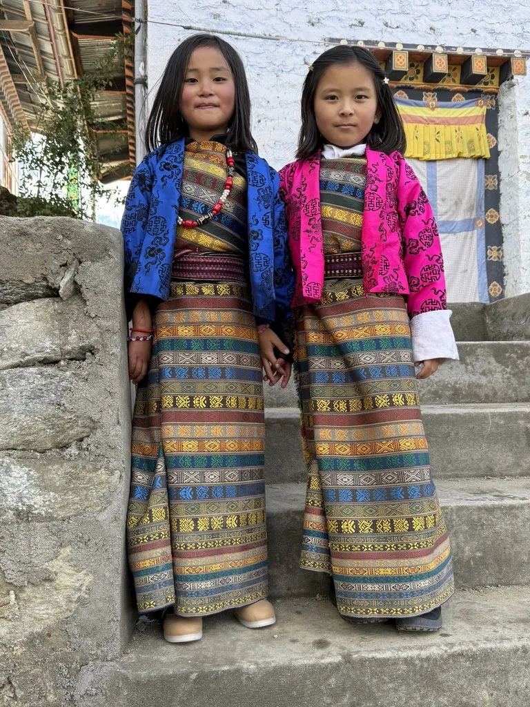 Two girls in traditional kira